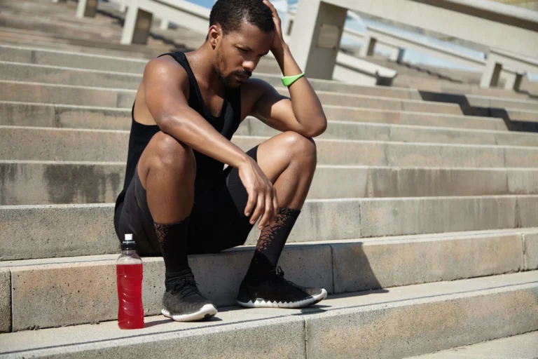 young-man-resting-after-exercising